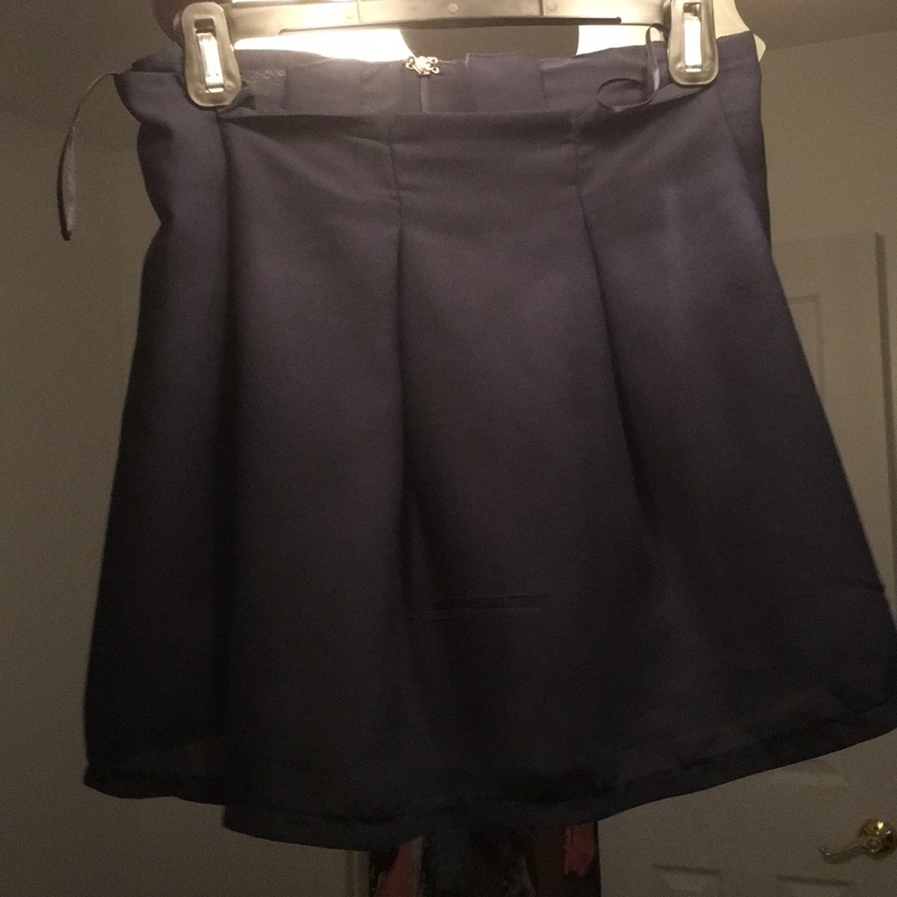 Pleaded blue short skirt